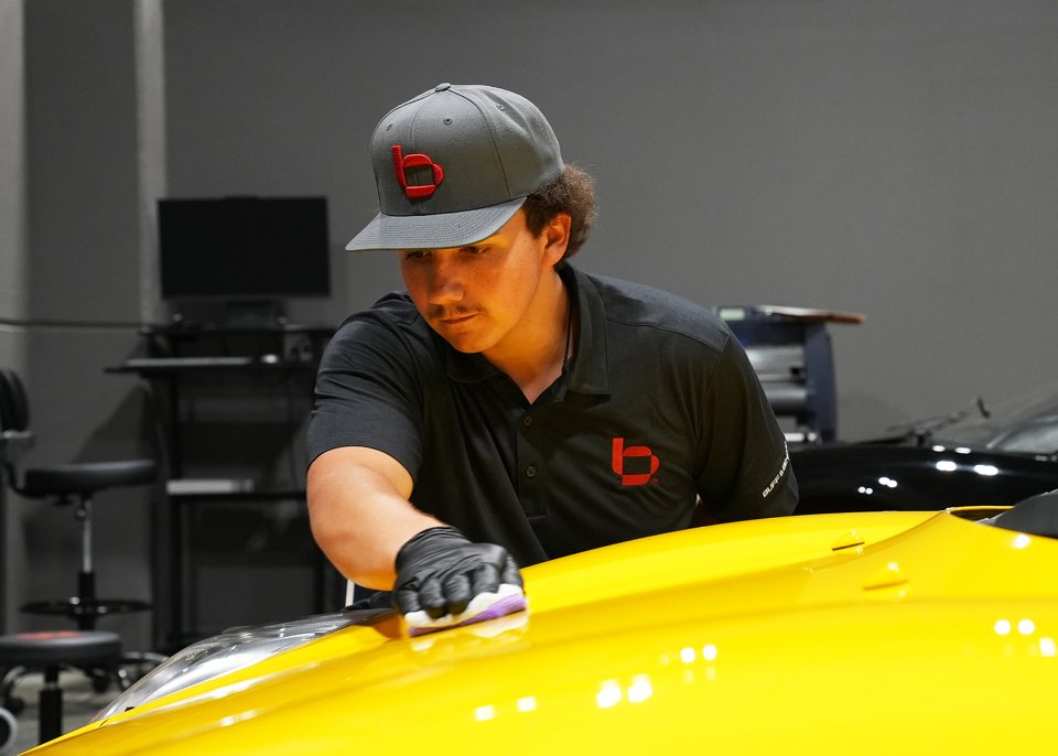 Coating a yellow Porsche hood
