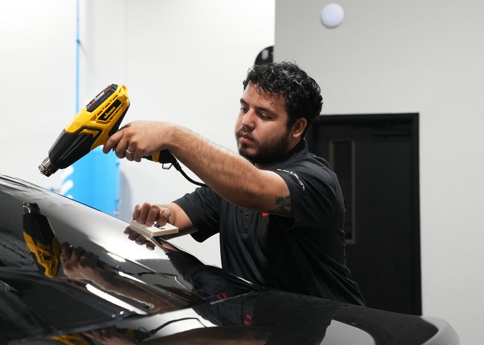 Shaping film on the back glass