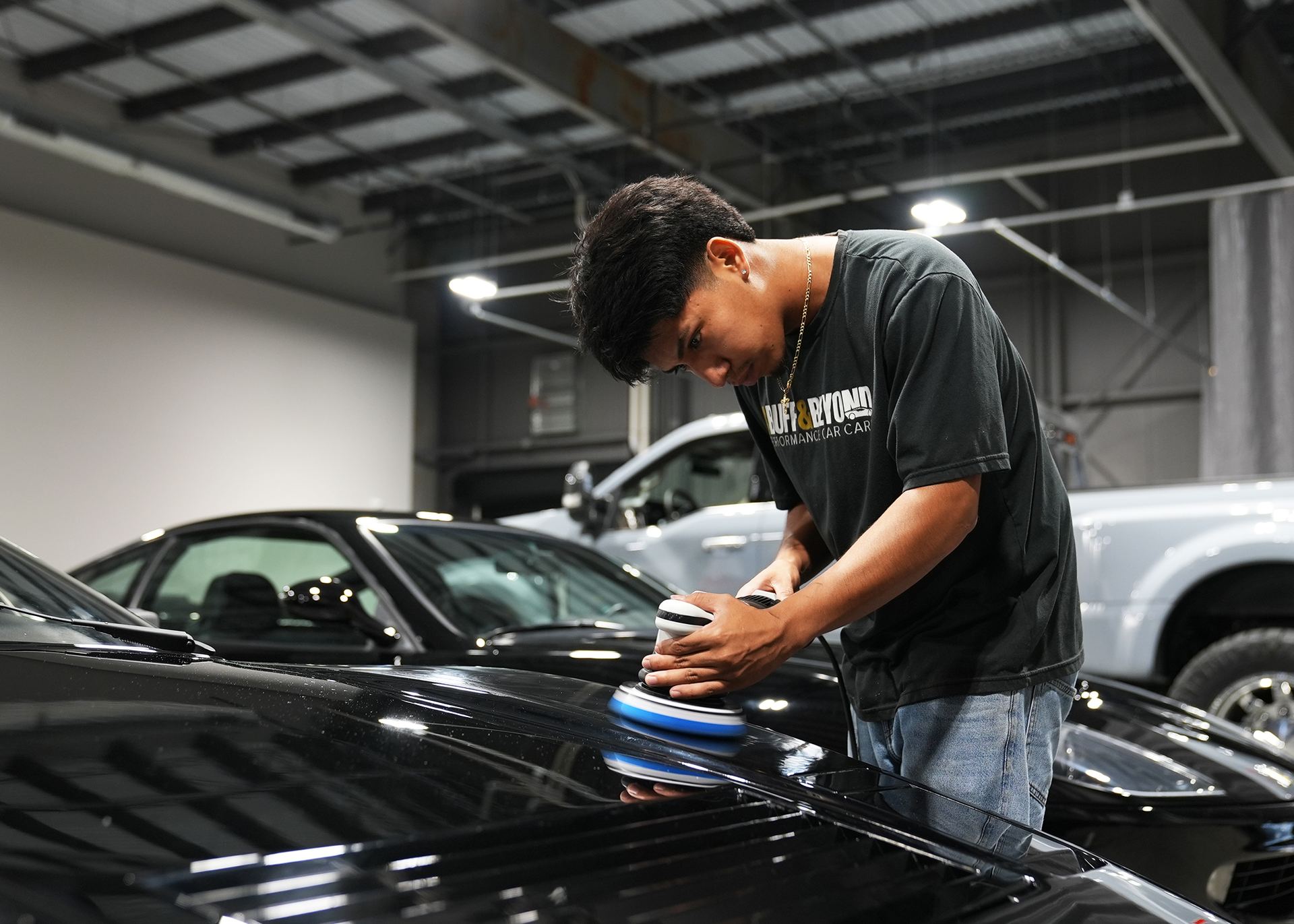Machine polishing the paint before coating at A Buff & Beyond