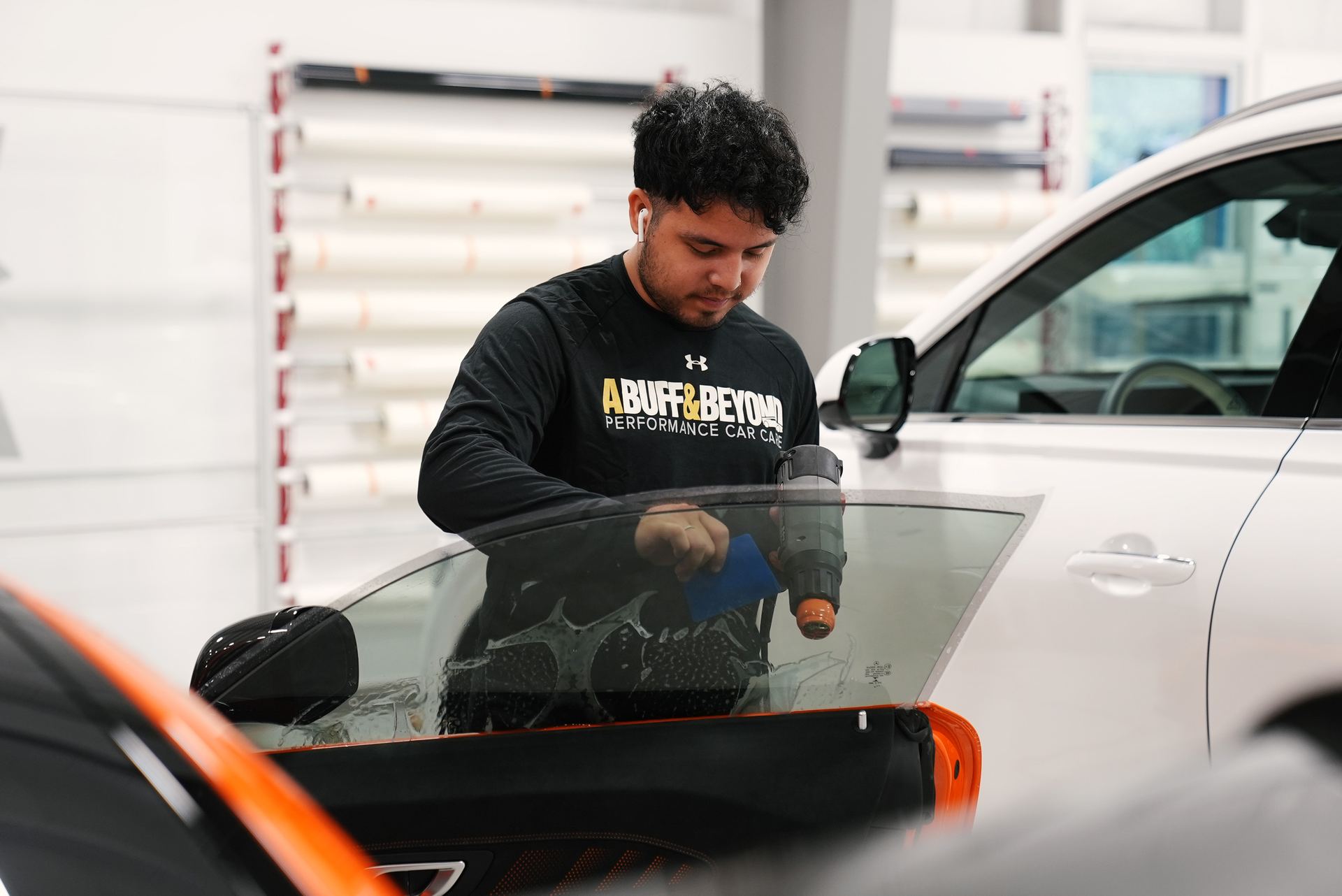 LLumar ceramic window tint being applied at A Buff & Beyond